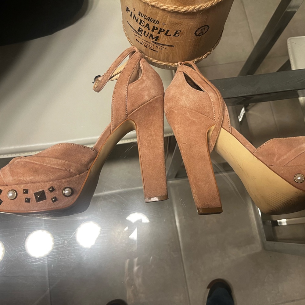 High sturdy heels ! Guess . Soft pink sued and leather interior.